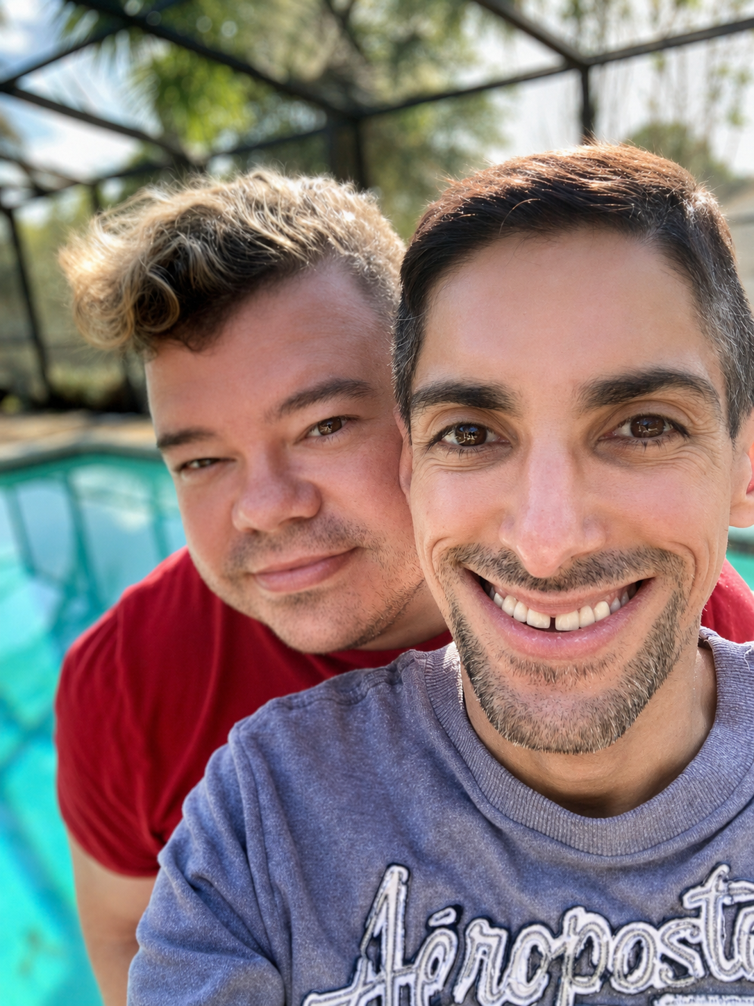 Chris and Will smiling together
